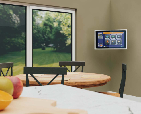 3D architectural render showing the GrandCare touchscreen